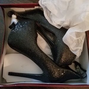 Black platform heels with ankle strap